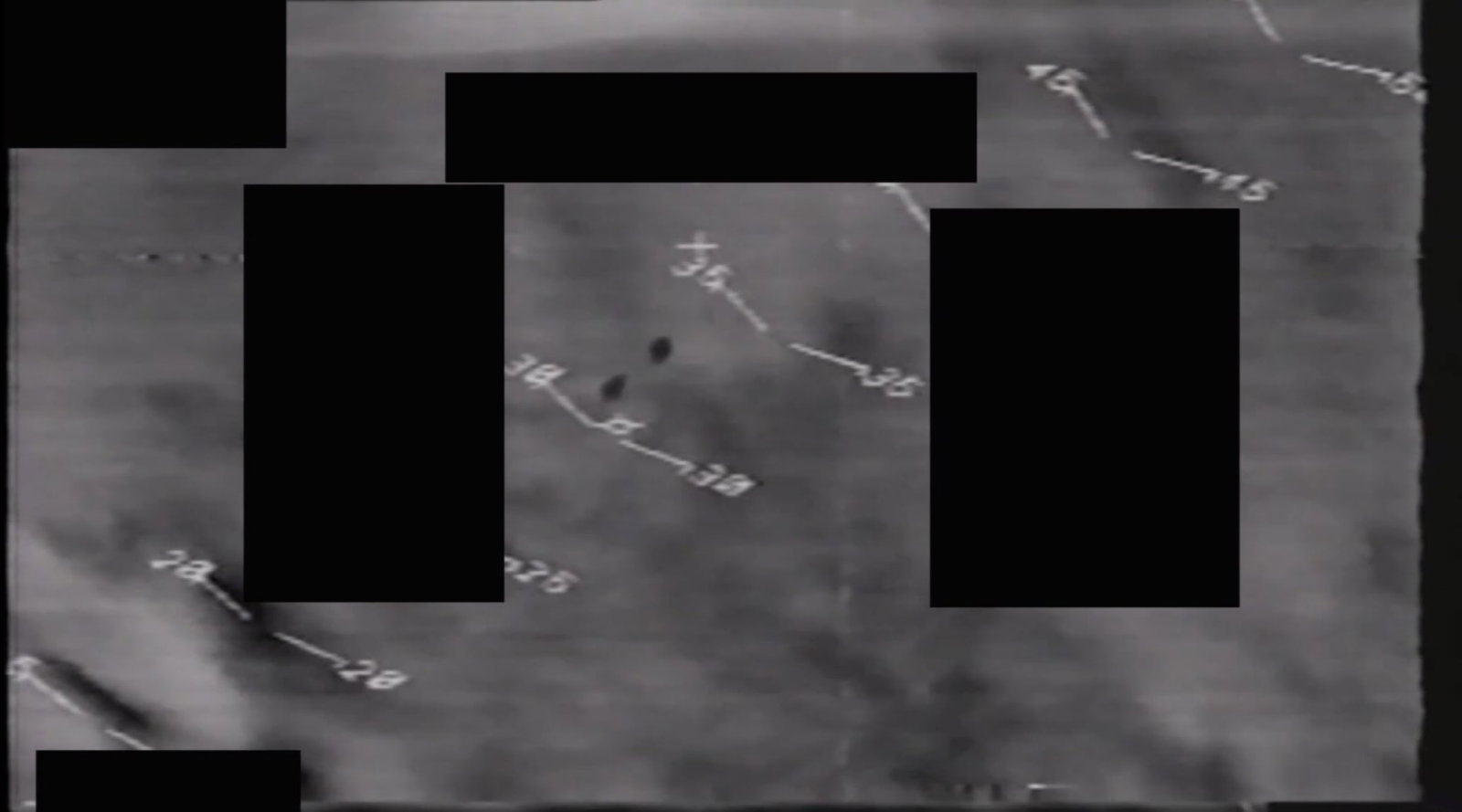 The Debrief source image from its PURSUE-video-analysis coverage, showing a Department of War UAP-release frame; source media, not a final identification.