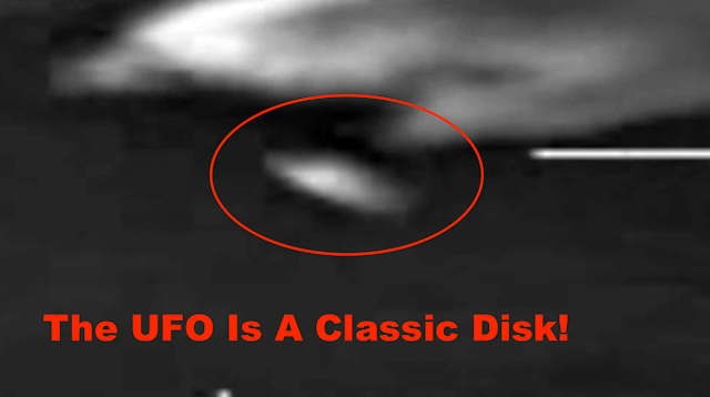 Source image for Official UAP clip re-circulated: disk-like object near a U.S. military aircraft